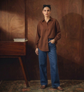 BROWN BUTTON DOWN SHIRT & MID-BLUE WIDE LEG JEANS
